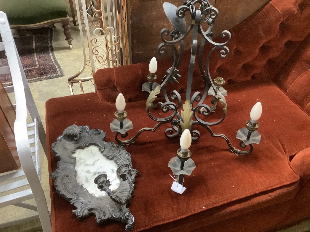 A wrought iron electrolier, height 54cm together with a wall sconce